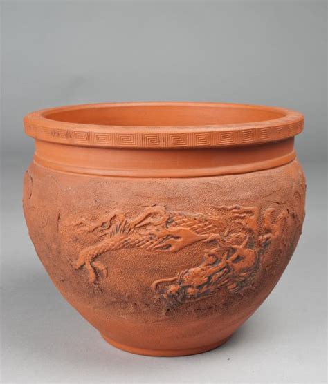 What are paper pot planters. Japanese Dragon Pottery Planter