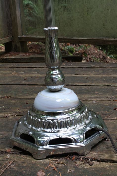 Depending on the type or style of floor lamp you get, it can help. Pewter (or chrome?) Floor Lamp | Collectors Weekly
