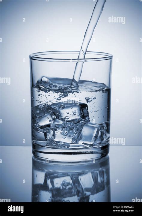 Ice Cubes And Glass Of Water Hi Res Stock Photography And Images Alamy