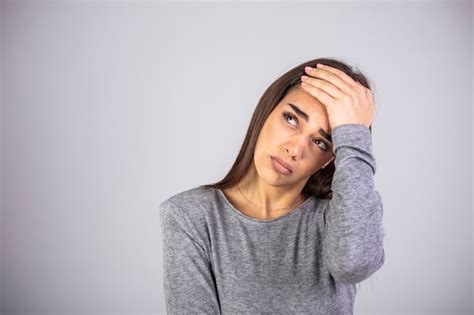 Premium Photo Woman Grabbing Her Head And Rubbing Temples Because Of Headache