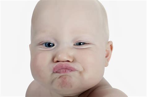 Baby Making A Funny Face Photograph By Stuart Corlett