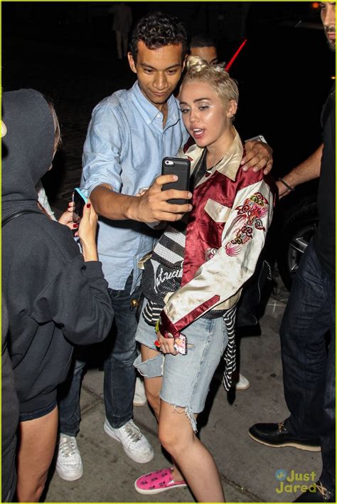 Miley Cyrus Snaps Selfies With Fans After Performance In New York