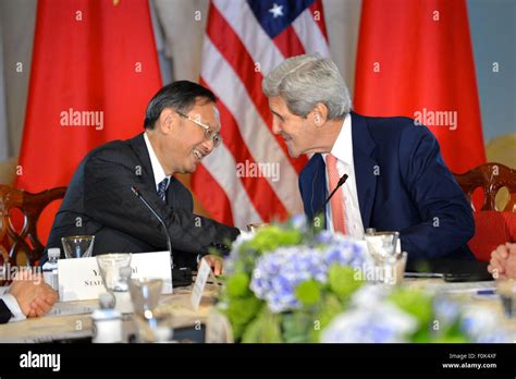 Secretary Kerry Shakes Hands With Chinese State Councilor Yang Jiechi After Addressing The