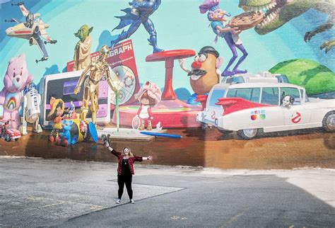 you have to check out the cincinnati toy heritage mural in otr — say yes to jess