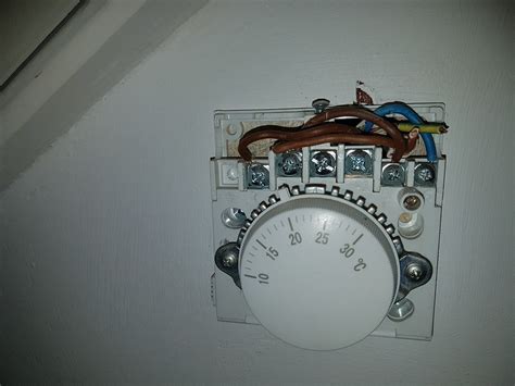 Remove the base from the new thermostat and position it on the wall where the previous thermostat was located. Wiring a New thermostat - Old to New - Help ? | DIYnot Forums
