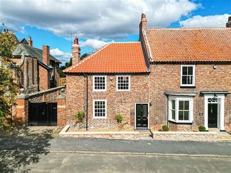 A peek behind the curtains of £1.29m home with two cottages 'ideal for