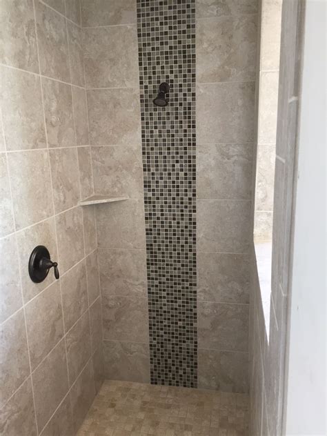 Shop by style to find minimal or ornate or choose border tiles to add decorative flair to your space. Decorative mosaic tile strip done vertically in the shower ...