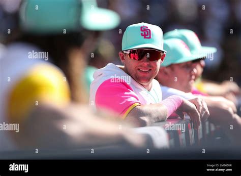 San Diego Padres Jake Cronenworth Smiles From The Dugout During A