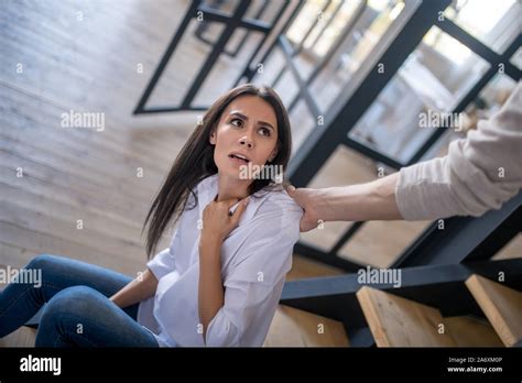 Dark Eyed Wife Feeling Terrified By Her Angry Violent Husband Stock