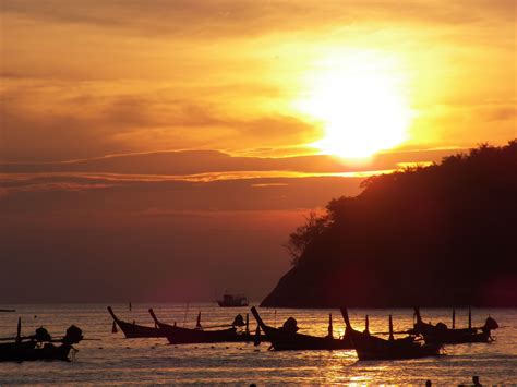 Phuket Thailand At Sunset With Longtail Boats Sunset Phuket