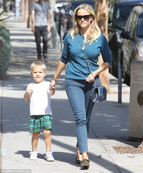 Reese Witherspoon Cradles Son Tennessee During Family Outing In La Daily Mail Online