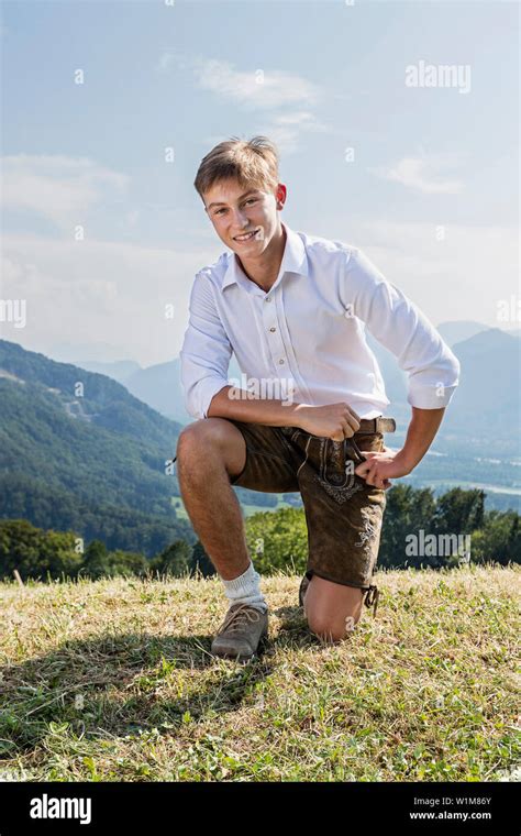 Teenage Boy Posing Outdoors In Traditional Bavarian Costume Bavaria