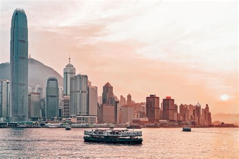 Premium Photo Star Ferry At Victoria Harbor Of Hong Kong At Sunset
