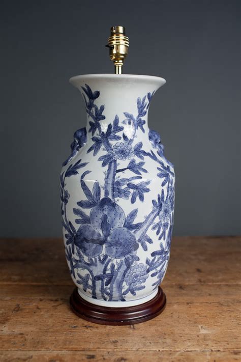 An elegant blue and white motif accents this square temple jar table lamp. Antiques Atlas - Chinese Blue And White Porcelain Table Lamp.
