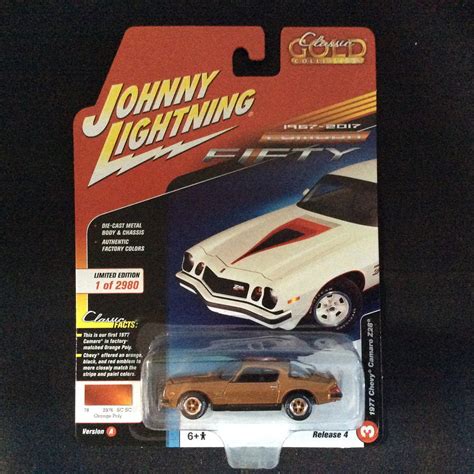 Johnny Lightning Orange 1977 Chevy Camaro Z28 Diecast Car