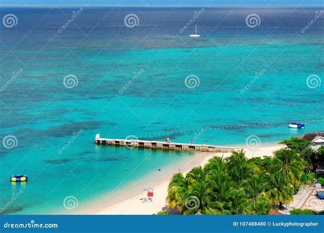 Aerial View On Beautiful Caribbean Beach And Pier In Montego Bay