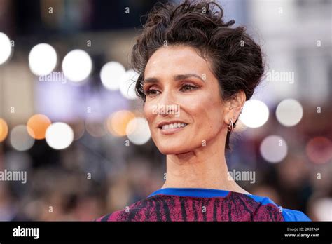 Indira Varma Poses For Photographers Upon Arrival At The Premiere Of