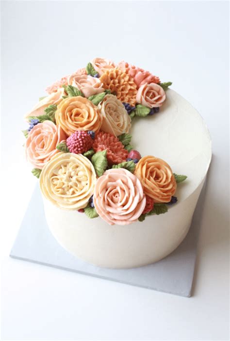 Smooth buttercream in pastel colours are swirled into a flush floral finish on chocolate sponge layers. Buttercream Flower Cakes Are a Delicious Way to Welcome Spring