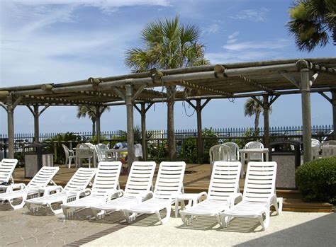 I ate in the lounge many nights and it was consistently good and what i needed every evening.the room was larger than i. Lounge chairs at the Pool | Holiday inn, Outdoor ...