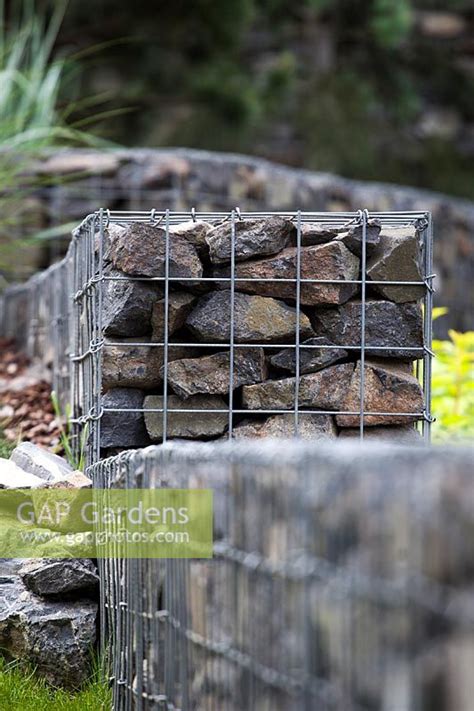 What is gabion wire mesh? Gabion wall detail... stock photo by Tomek Ciesielski ...