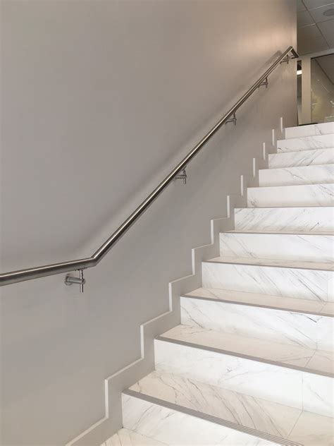 Handrails on stairs and landings should have a minimum height of 900m. Commercial Glass Railings in Doral | Bella Stairs