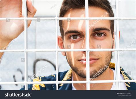 Portrait Young Man Behind Bars Fences Stock Photo 1162376941 Shutterstock