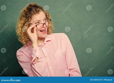 playful teacher woman school teacher shy and pretty lady wear eyeglasses chalkboard background