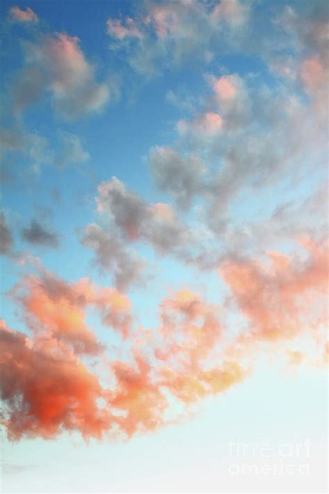 Vibrant Orange Clouds On Gradient Blue Sky Textured Background Twilight