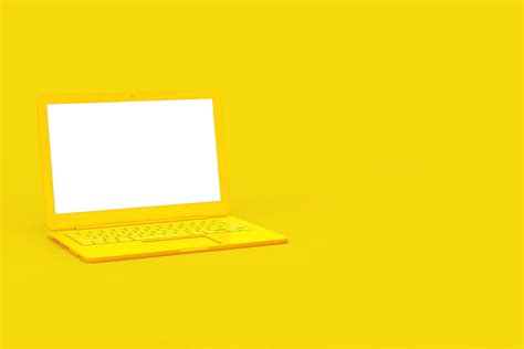 Premium Photo Modern Yellow Laptop Computer With Blank Screen For