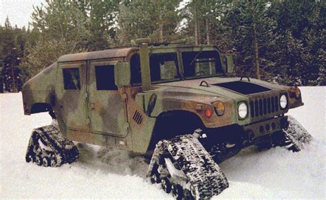 Humvee With Snow Tracks