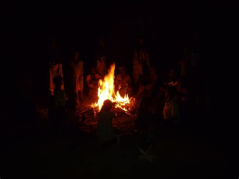 A Late Night Night Camp Fire With The Local Village They Burn Dried