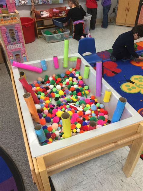 Fun Sensory Table Idea Teaches Colors Sizes And Helps With Fine Motor