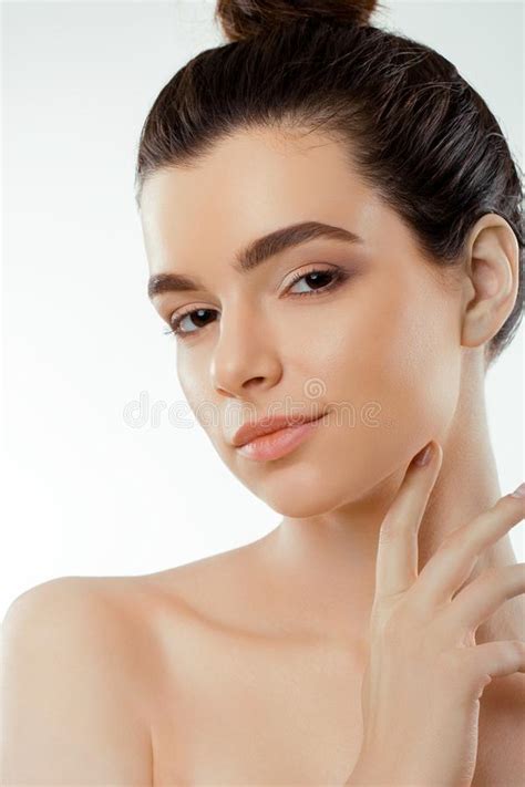 Beautiful Young Woman With Clean Fresh Skin Touch Own Face Cosmetology