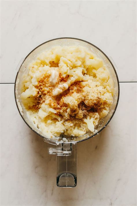 Food Processor With Mashed Cauliflower Spices And Vegan Butter For A