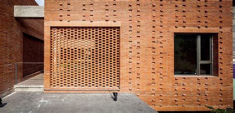Perforated Brick Screens Create Private Space Admist Busy Bangkok
