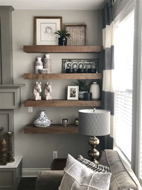 Wood Floating Shelves Next To Gray Mantle Joanna Gaines Inspired