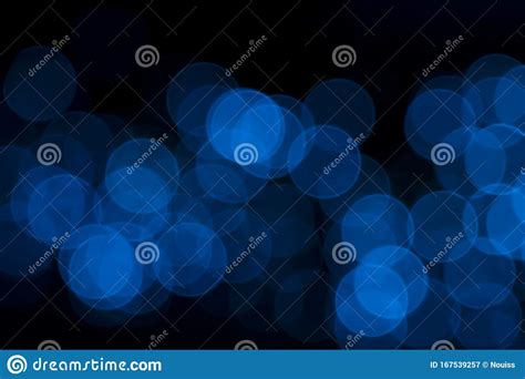 Defocused Of Blurred Blue Bokeh Circle Light From Lighting Bulb In The