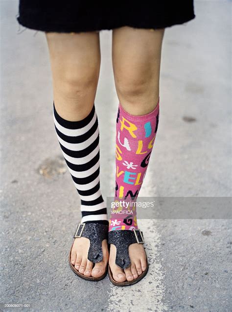 Teenage Girl Wearing Mismatched Socks Low Section Photo Getty Images
