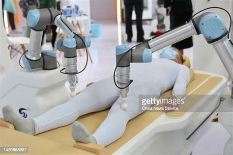 Robot Massage Photos And Premium High Res Pictures Getty Images