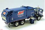 Blue Garbage Trucks In Action Images