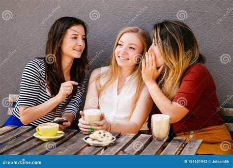 Woman Whispering Secret At Friends Ear Gossip Stock Photo Image Of