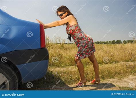 Young Woman Pushing A Car Stock Images Image 5970994