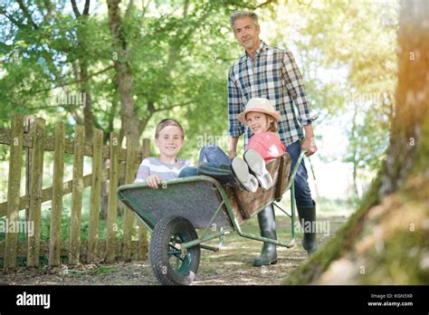 Kids Wheelbarrow Hi Res Stock Photography And Images Alamy