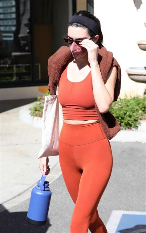 Kendall Jenner Flashes Her Taut Midriff In Orange Athletic Wear In Weho
