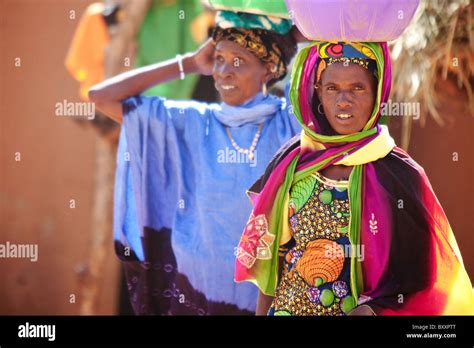 Two Fulani Women Bring Fresh Milk To Sell In The Weekly Djibo Market In