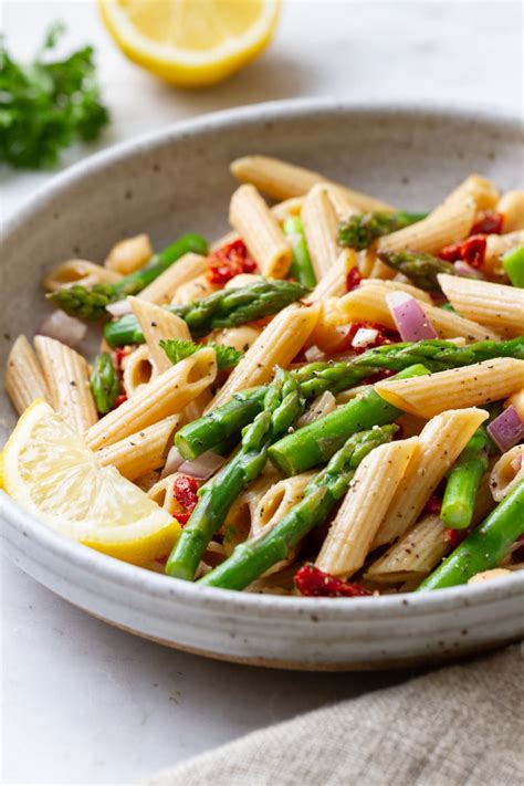 We've got kalamata olives, tomatoes, cucumber, and feta cheese, all tossed with pasta and a lemony dressing. Easy Lemony Asparagus Pasta Salad - The Simple Veganista