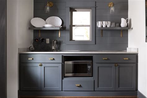 Black, navy or cherry wood cabinets are ideal for larger kitchens and will create a warm, inviting space. small gray kitchen | Grey kitchen walls, Grey cabinets ...