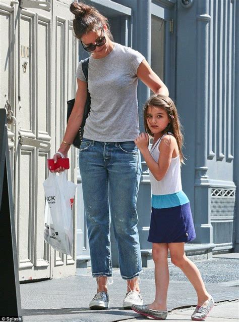 katie holmes holds hands with suri as they shops for art supplies denim fashion katie holmes