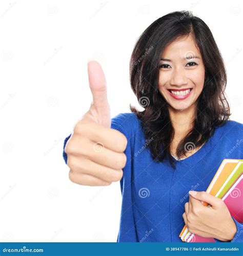 Young Female Student With Books Showing Thumb Up Stock Photo Image Of