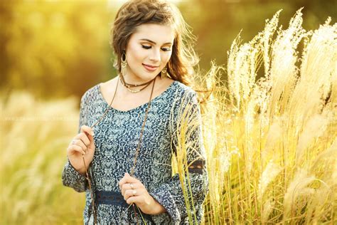Natural Senior Picture Portrait Ideas In Tall Grass Backlit Golden